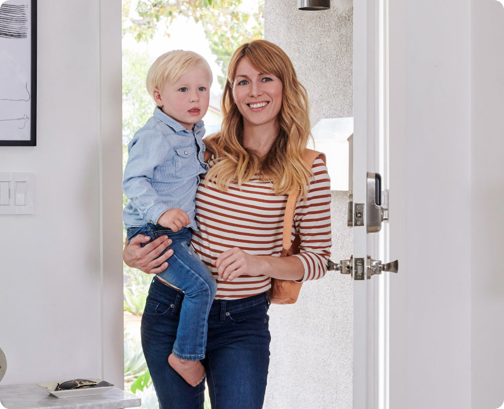 Young family entering the house