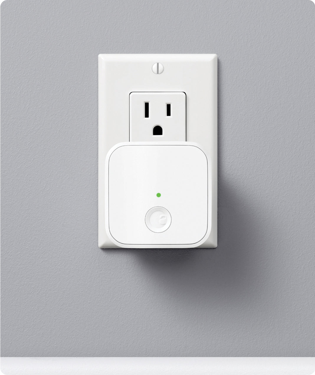 August home pod extender plugged into a wall outlet