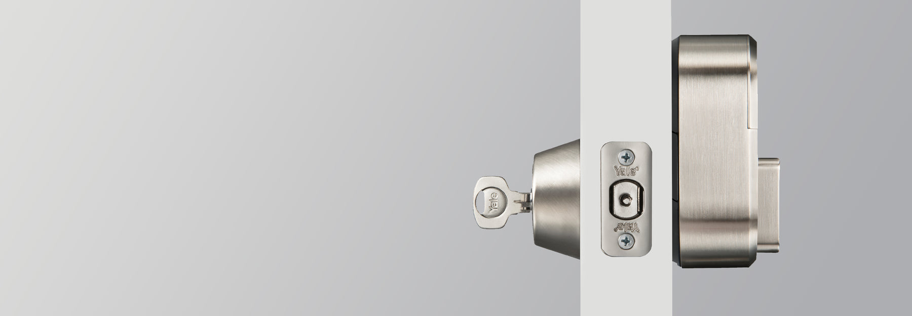 Side view of a yale lock installed on a door